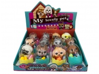 Piesek z akcesoriami w plastikowym jaju 11x7 cm - 1 szt mix