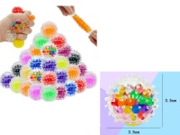 Piłka, gniotek antystresowy jeżyk z kuleczkami